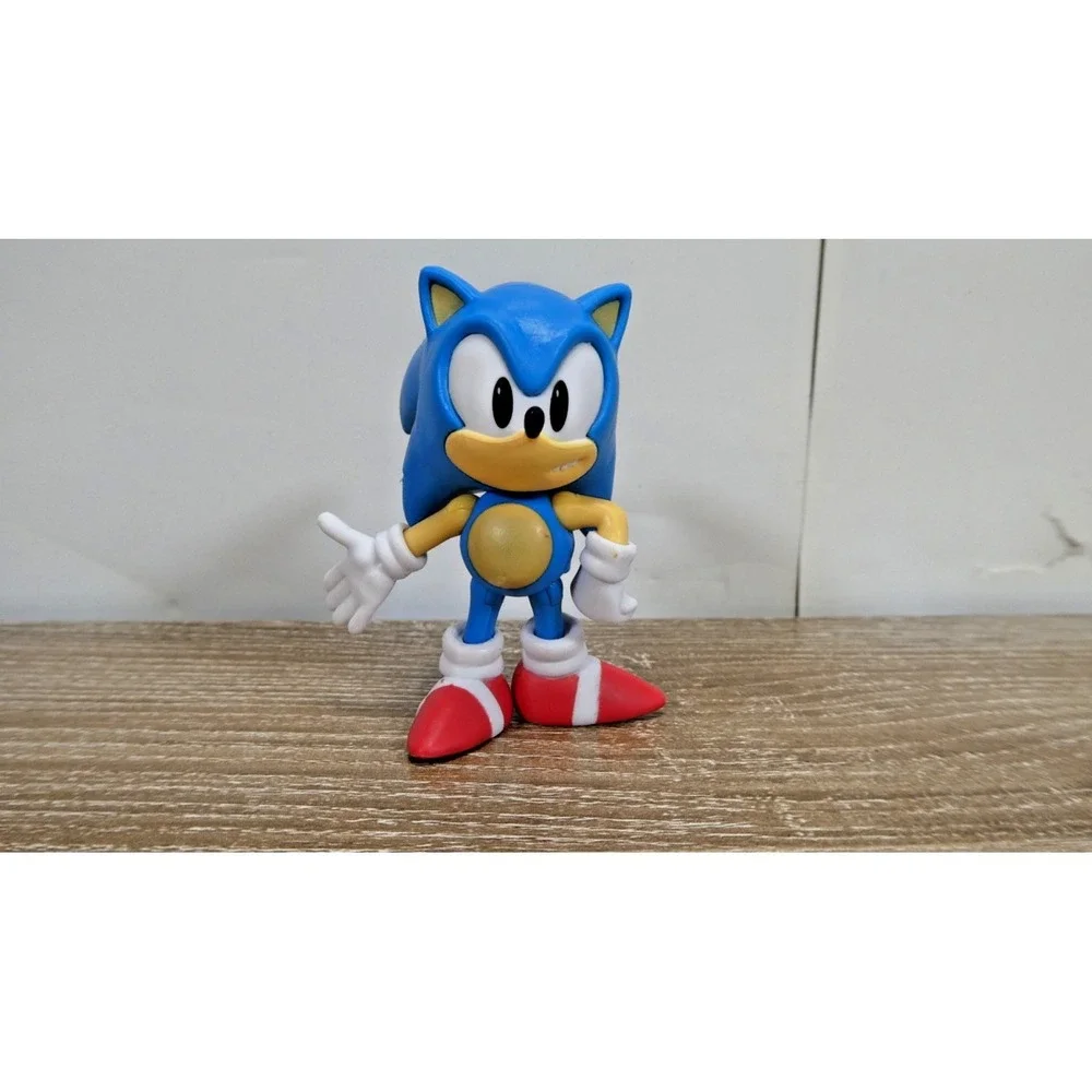 Lot Of 4 Sonic The Hedgehog Figurines aprox.  4 Inches tall SEGA